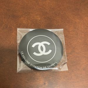Chanel compact mirror.